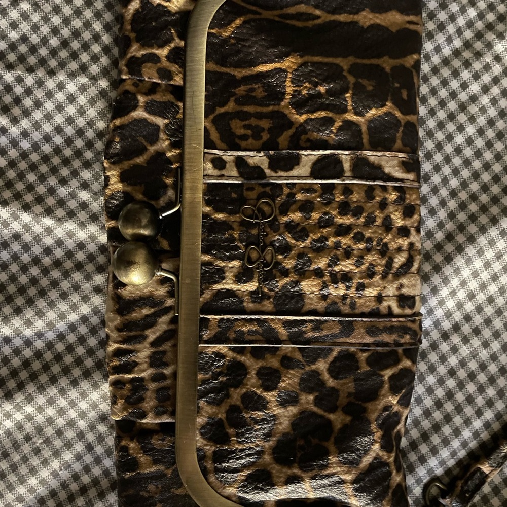 Jessica Simpson snake skin crossbody purse.
